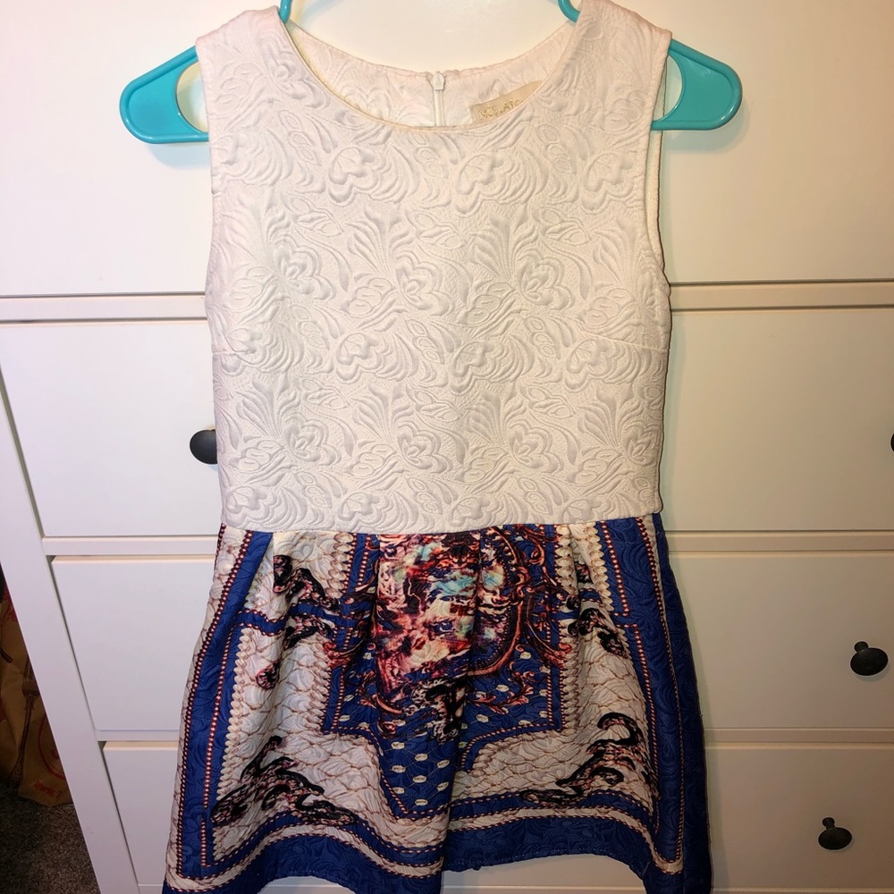 White and navy blue romper